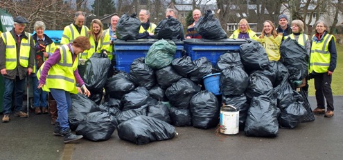 Photo fo some of the volunteers with some of the rubbish collected