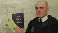 Constable Iain Meggatt with the information leaflet